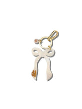 Load image into Gallery viewer, Solar Eclipse Hand-painted Coquette Bow Bag Charm + Keychain