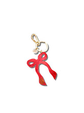 Load image into Gallery viewer, Solar Eclipse Hand-painted Coquette Bow Bag Charm + Keychain