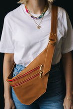 Load image into Gallery viewer, CAMPFIRE COUTURE DOUBLE POCKET SLING BAG- SMOOTH CAMEL LEATHER WITH RED ZIPPER