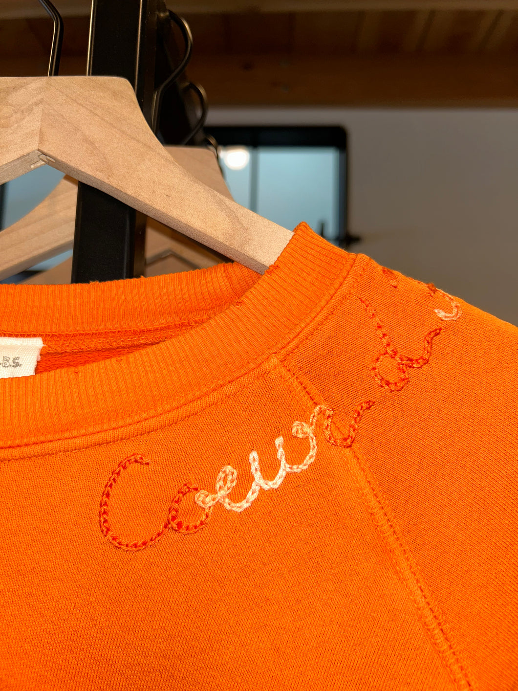 ORANGE EMBROIDERED CDA SWEATSHIRT
