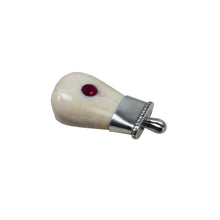 Load image into Gallery viewer, Tusk pear-shaped pendant with a red stone.
