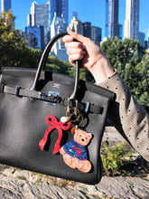 Load image into Gallery viewer, Solar Eclipse Hand-painted Coquette Bow Bag Charm + Keychain
