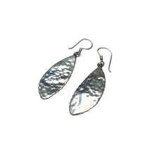 Load image into Gallery viewer, Pair of hammered sterling silver leaf-shaped dangle earrings.
