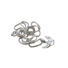 Load image into Gallery viewer, Sterling silver necklace showing the back of a small sparrow pendant.
