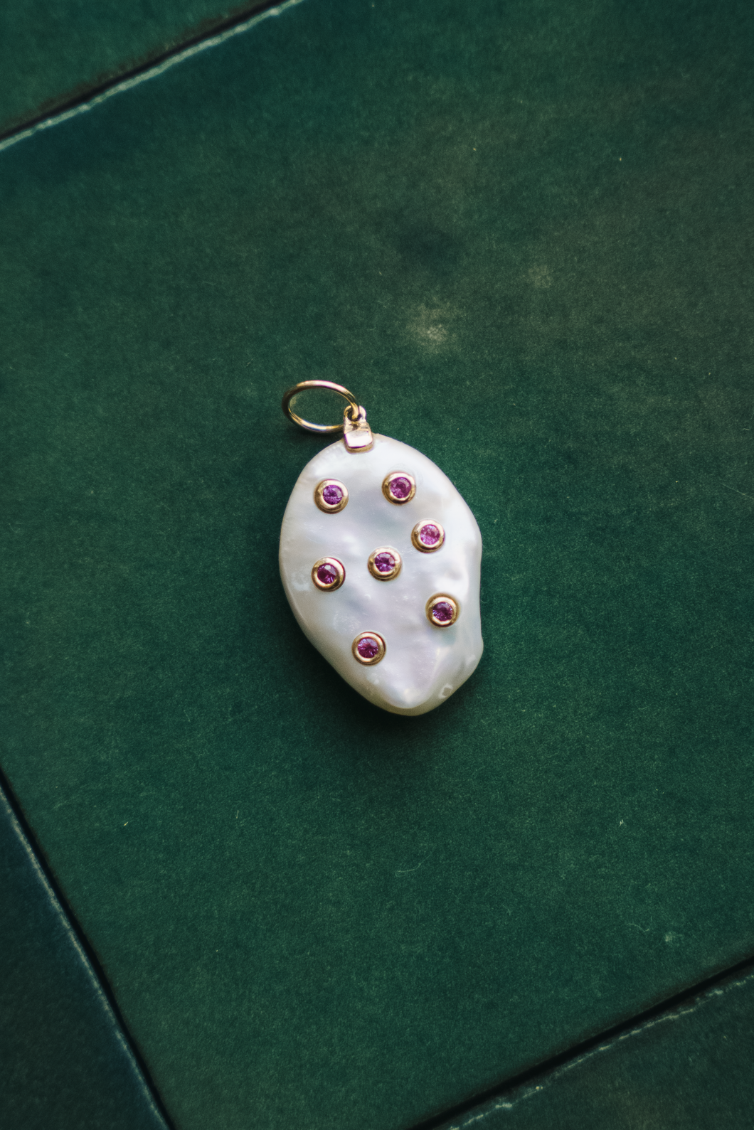 14K GOLD CHARM, MOTHER OF PEARL WITH PINK RUBIES