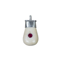 Load image into Gallery viewer, Tusk pear-shaped pendant with a red stone.
