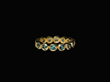 Load image into Gallery viewer, 18K GOLD ETERNITY RING WITH BLUE TOPAZ
