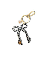 Load image into Gallery viewer, Solar Eclipse Hand-painted Coquette Bow Bag Charm + Keychain
